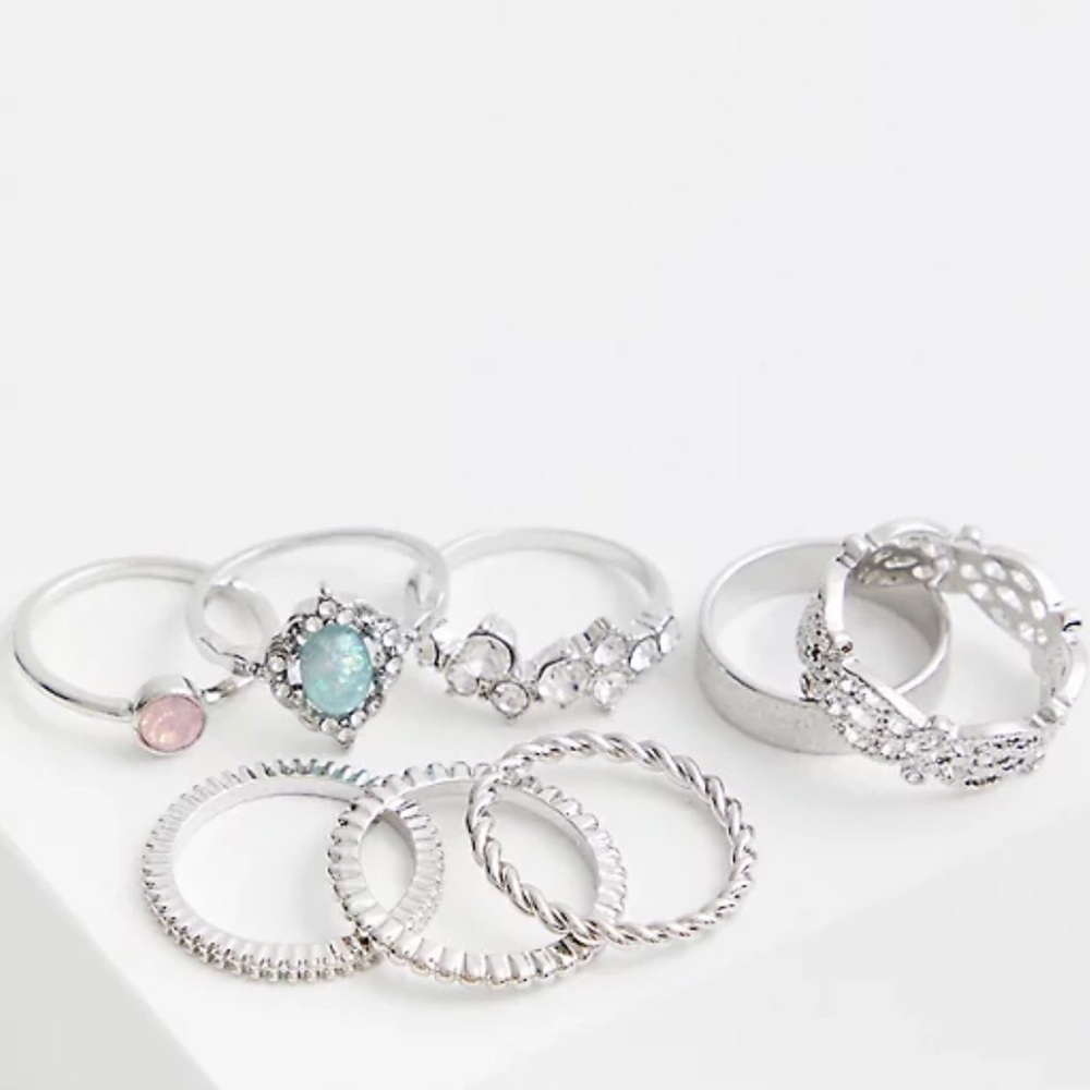 TORRID SILVER RING SET OF 8 RINGS.SIZE 8